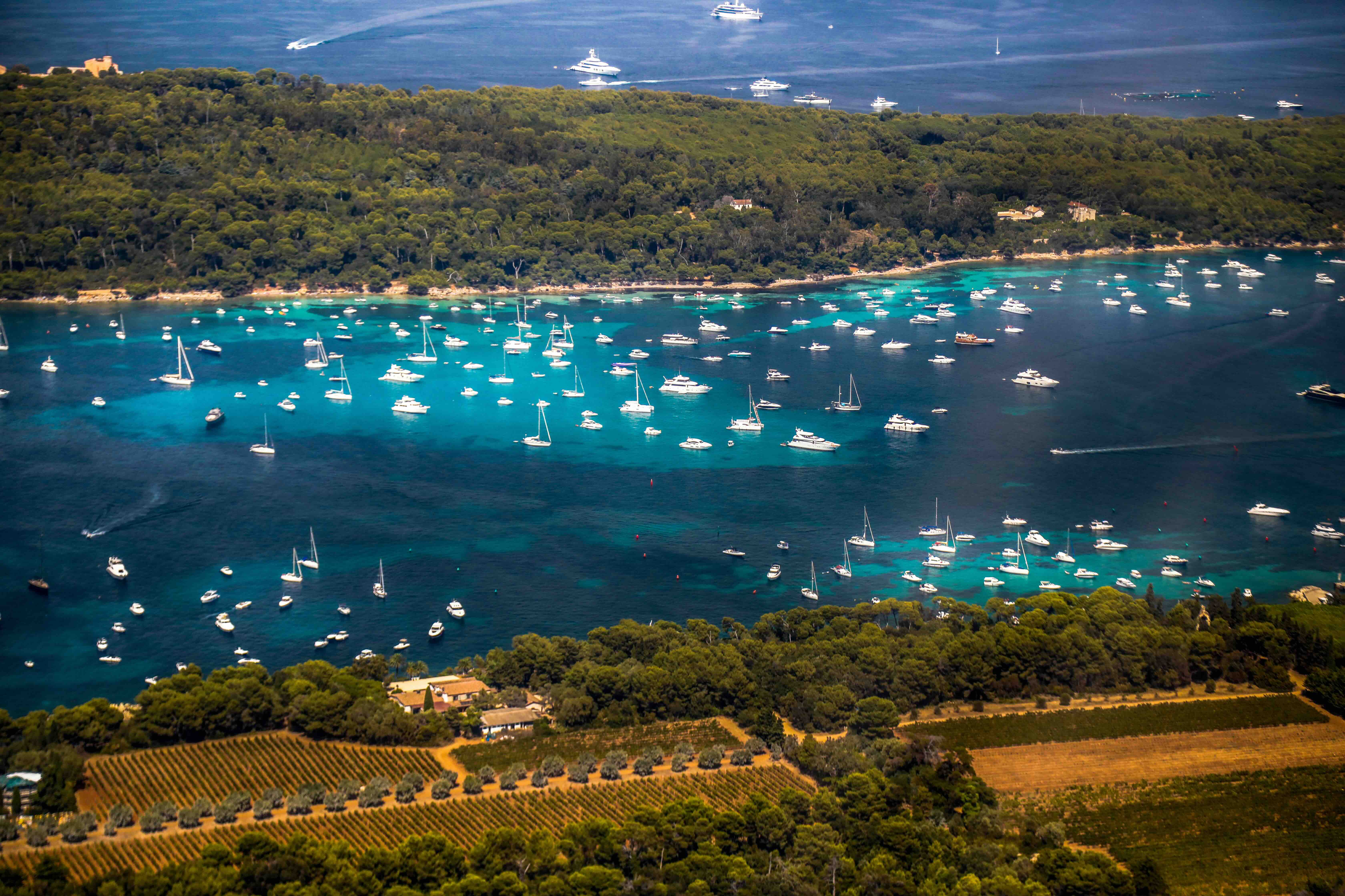 Turquoise waters of the Îles de Lérins near Cannes, a popular anchorage for private yacht charters in France.