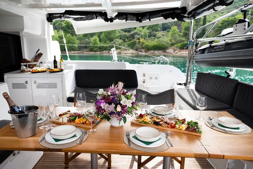 Lagoon 46 Crewed Catamaran JOANSEA aft deck dining table