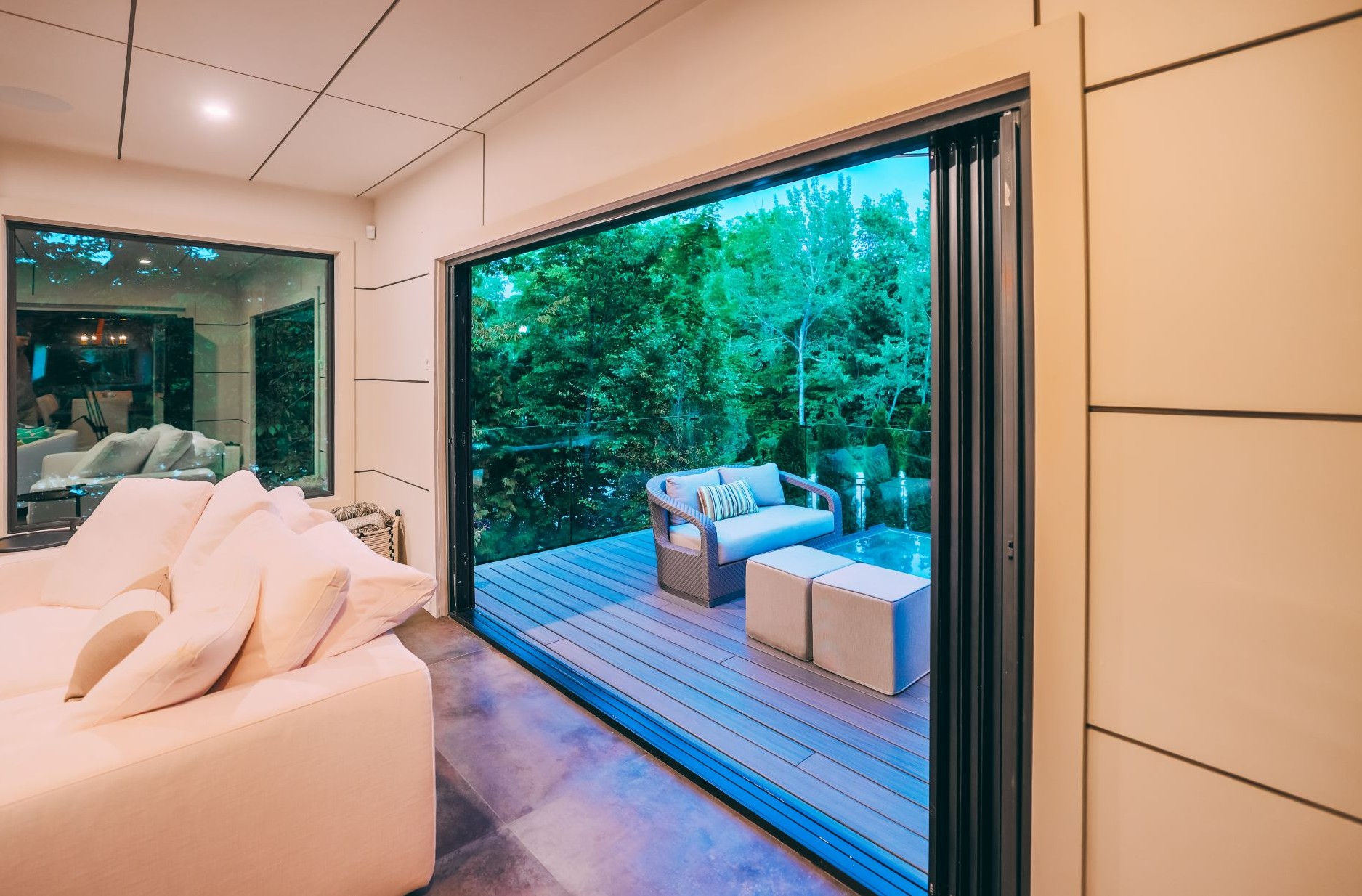 living room with bifold patio doors