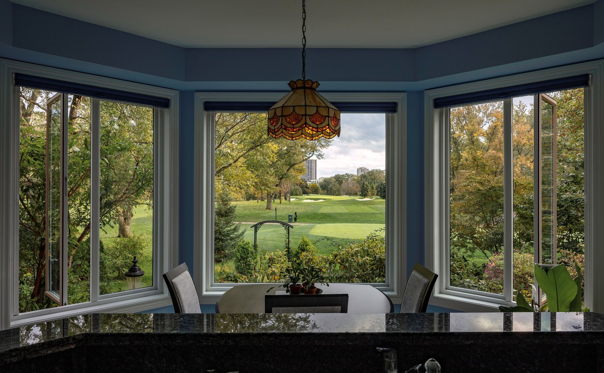 dining room with bay windows