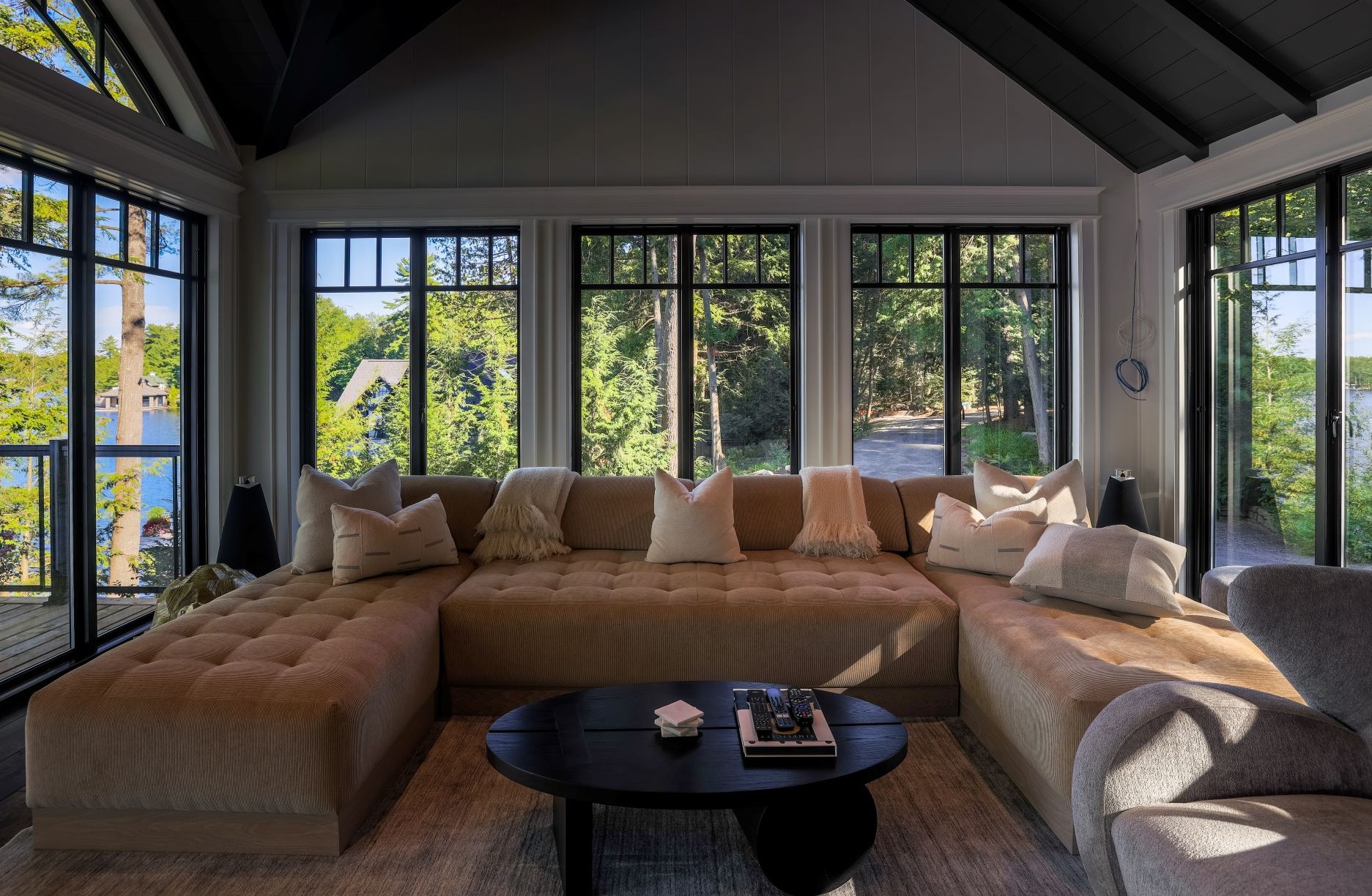 living room with multiple double pane windows and french doors