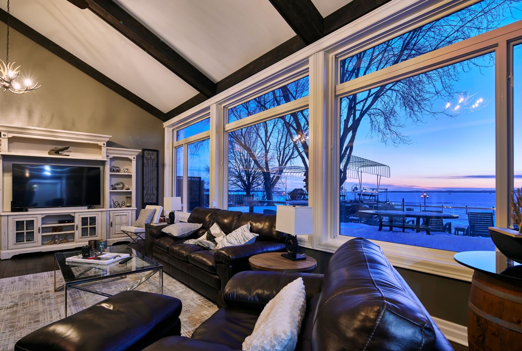 living room with multiple large picture windows