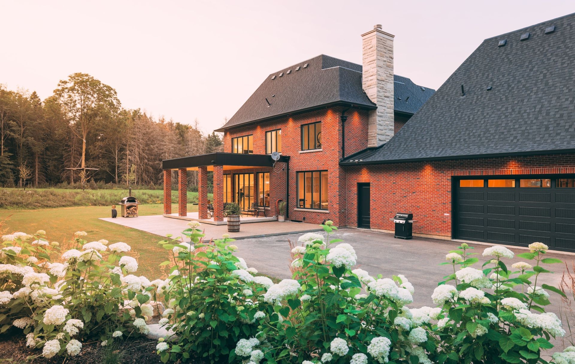 house with brick siding and black windows