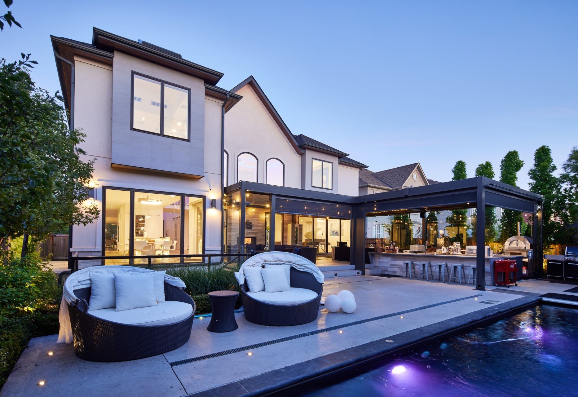 house with multiple black windows with slim frames