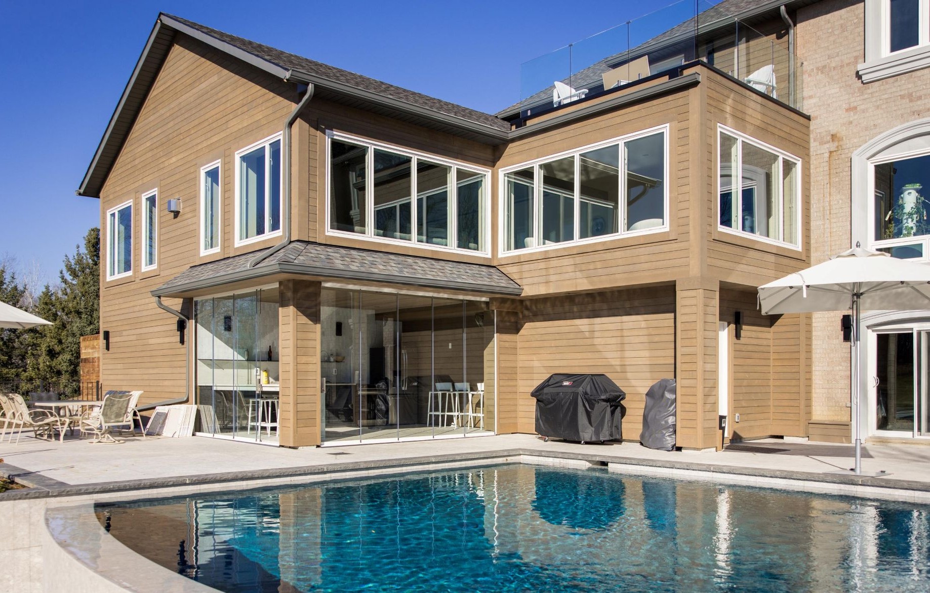 house with sliding windows