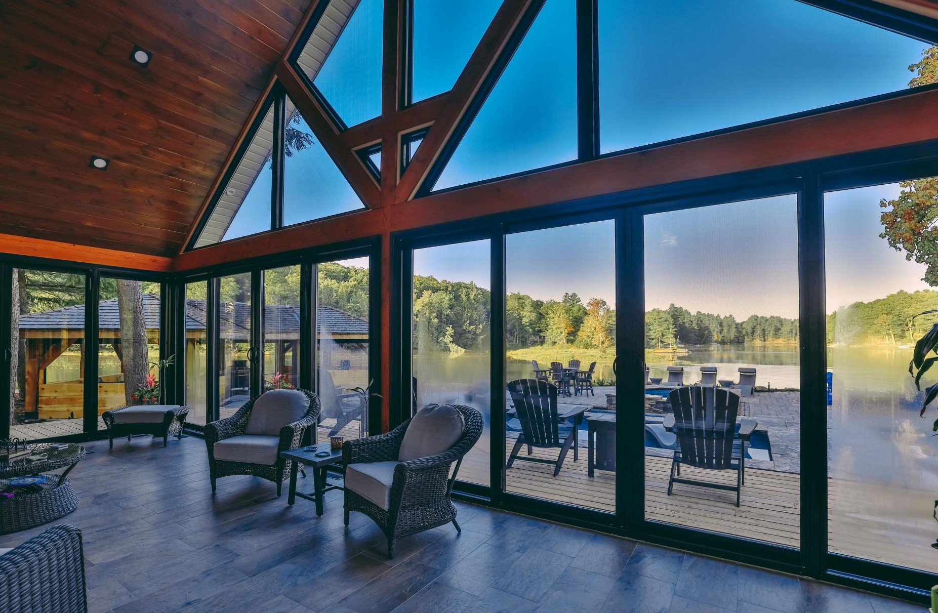 living room with corner sliding windows and specialty shaped windows
