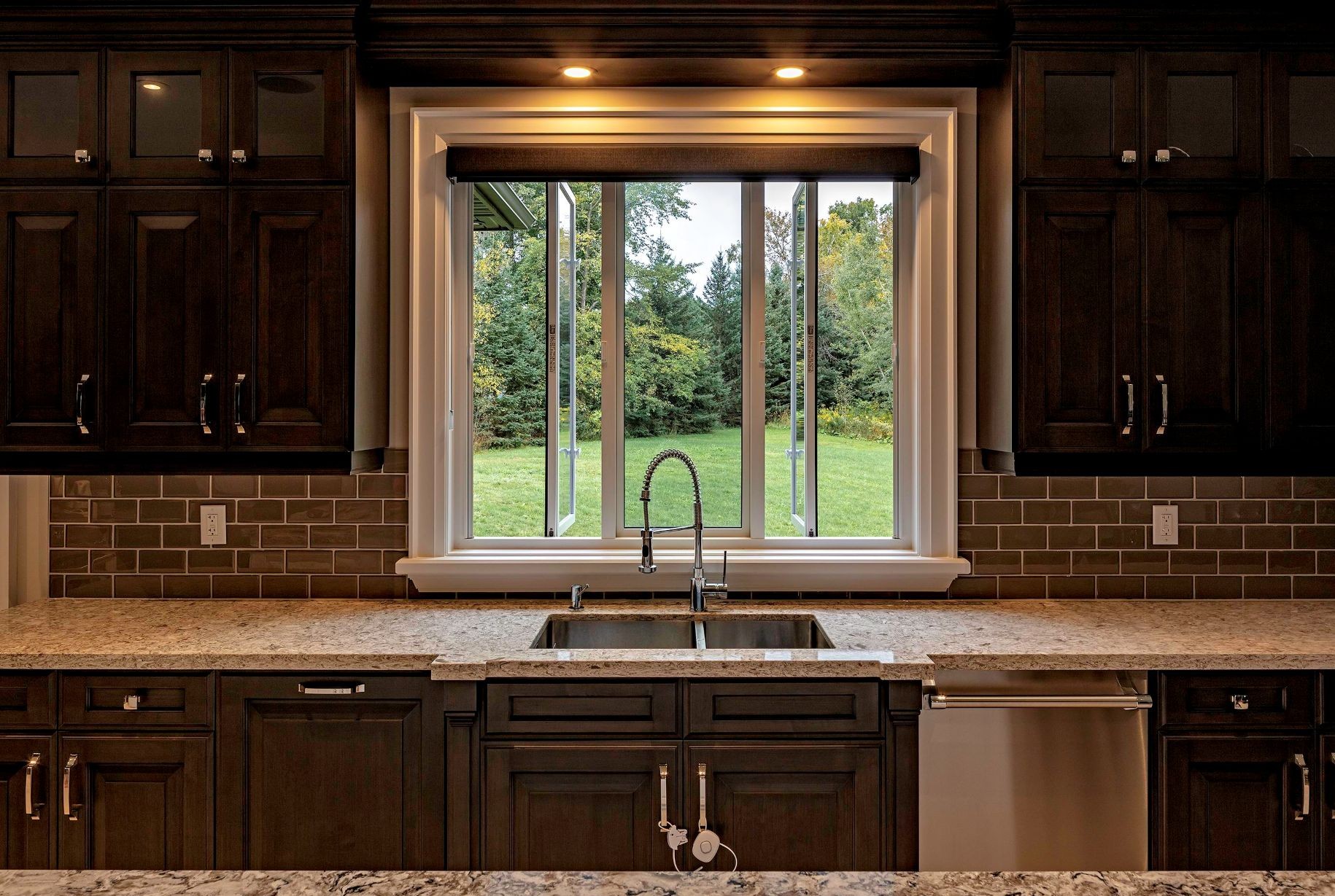 casement windows above the sink
