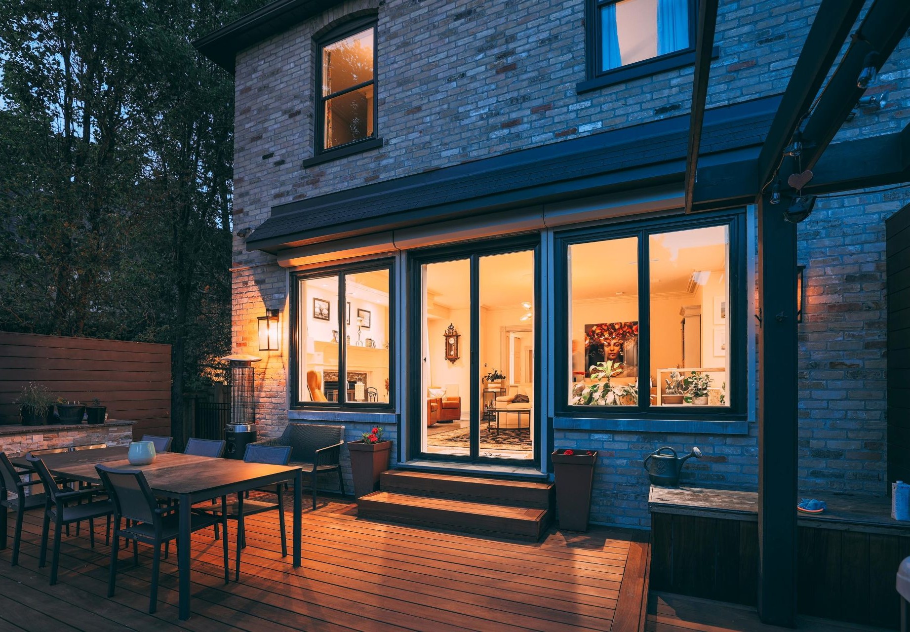 house with French doors and casement windows on both sides