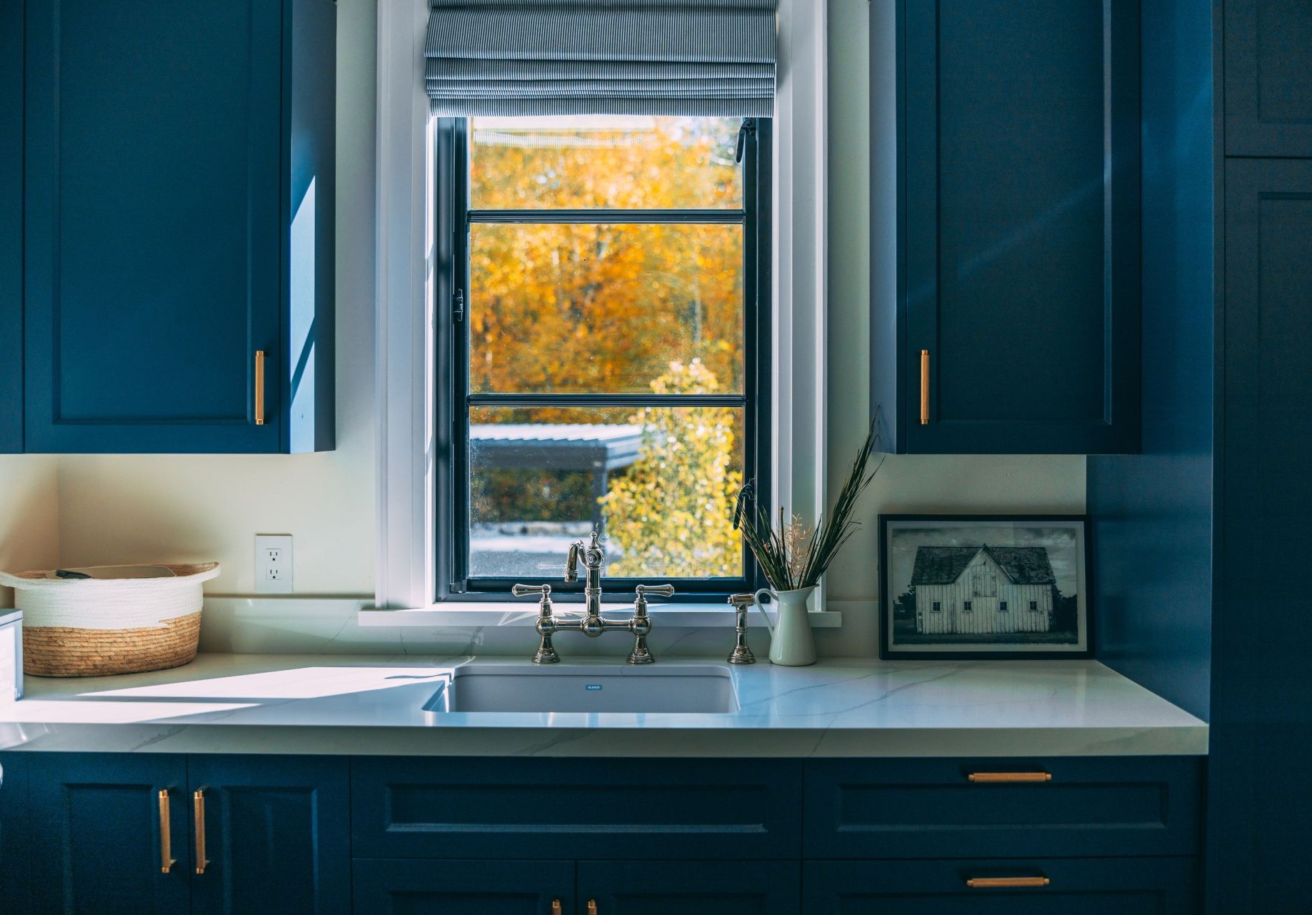 standard-sized casement window above sink