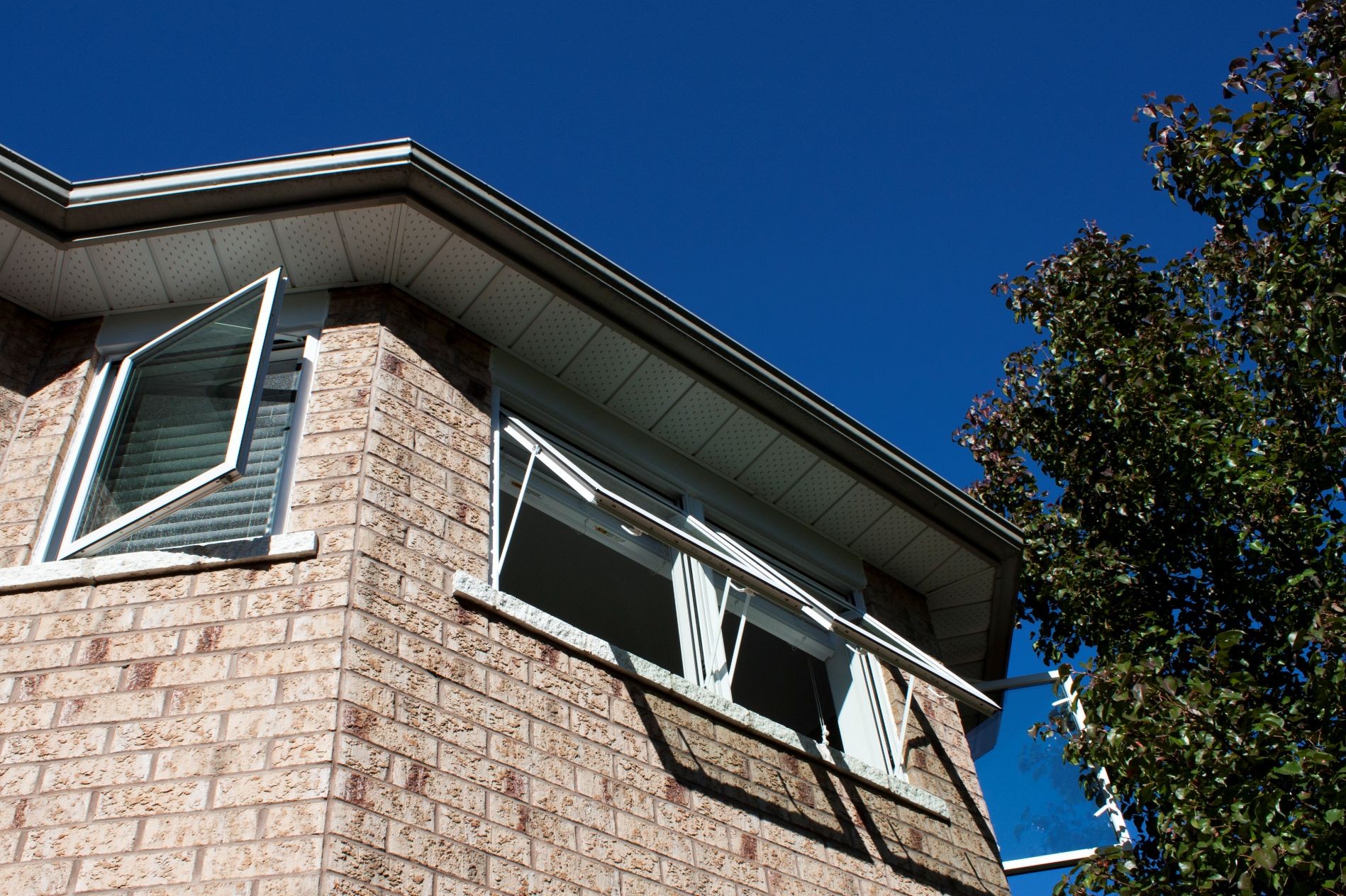 two awning windows that don't meet egress requirements