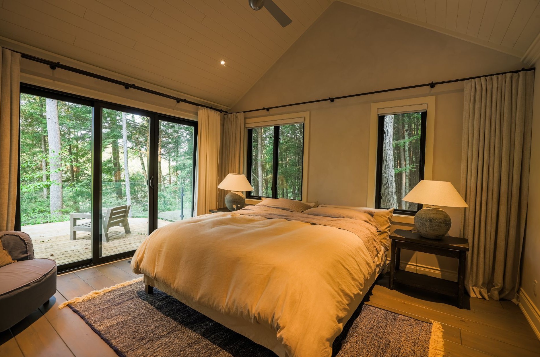 bedroom with layered window treatments