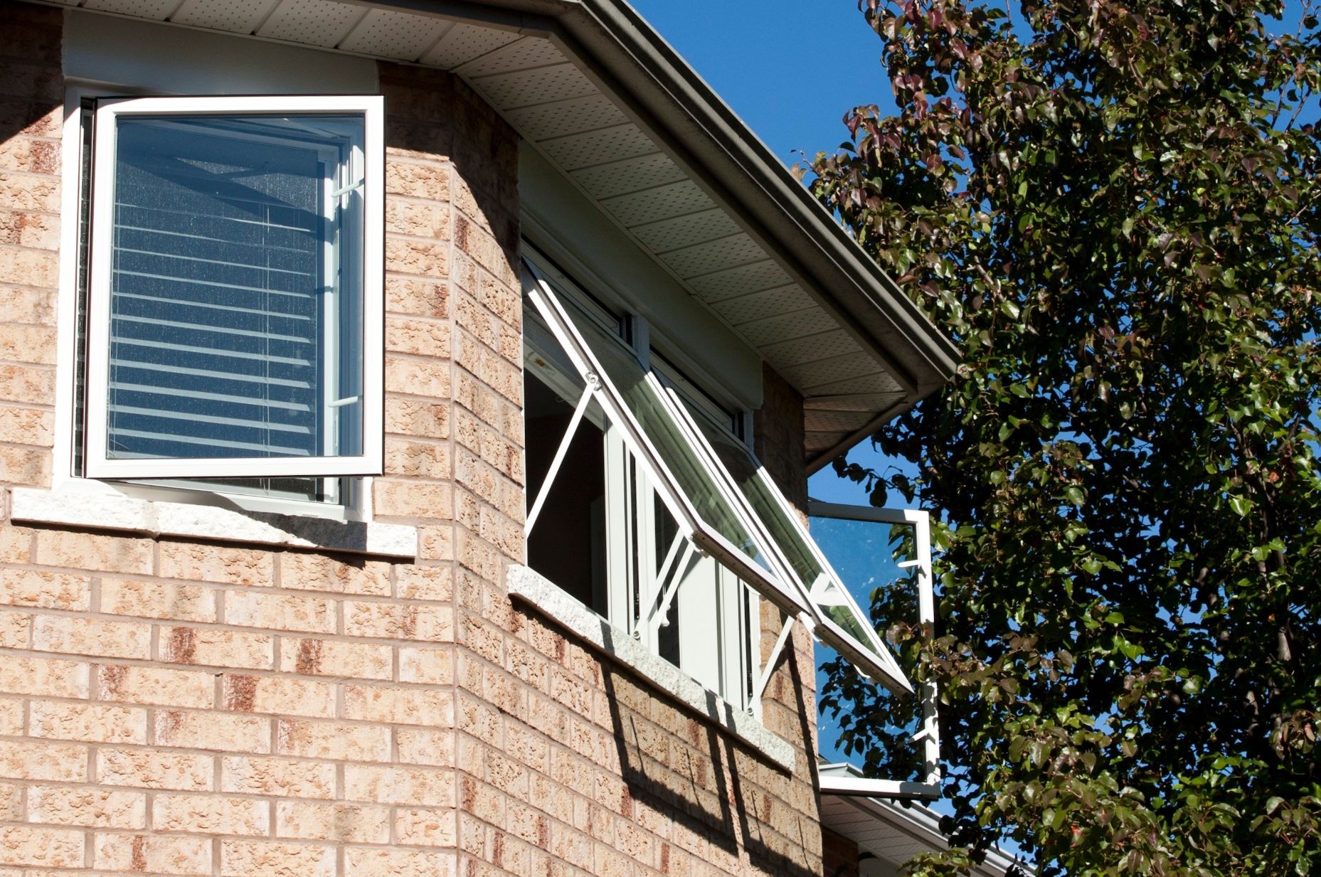 two awning windows flanked by two casement windows