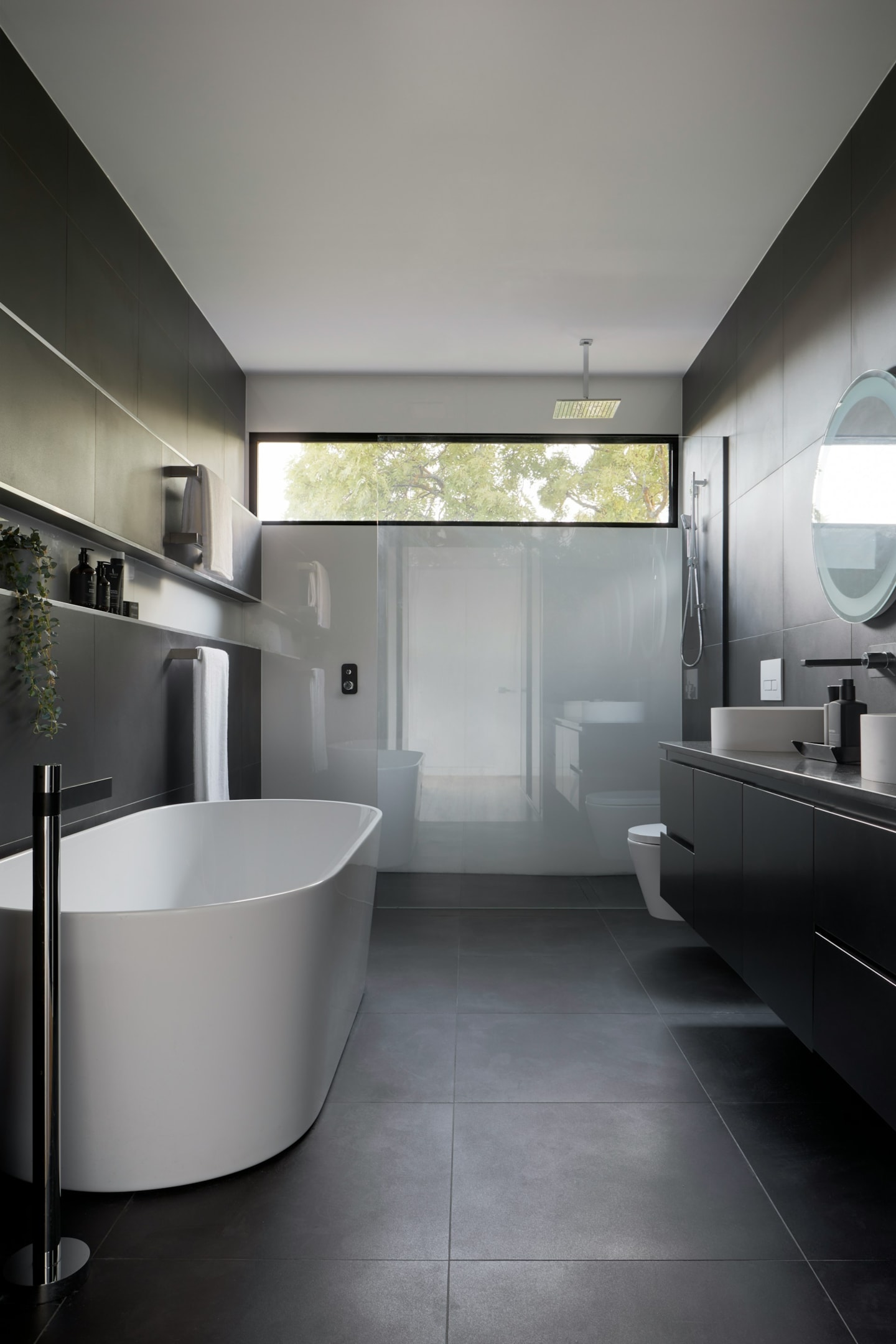 bathroom with high-set window above shower