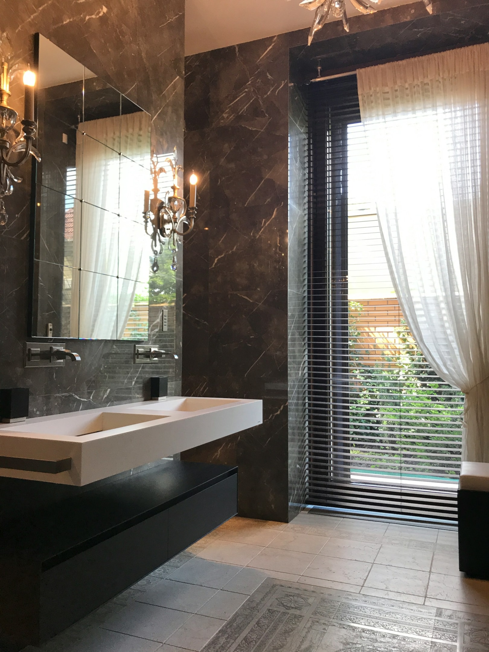 large bathroom window with venetian blinds