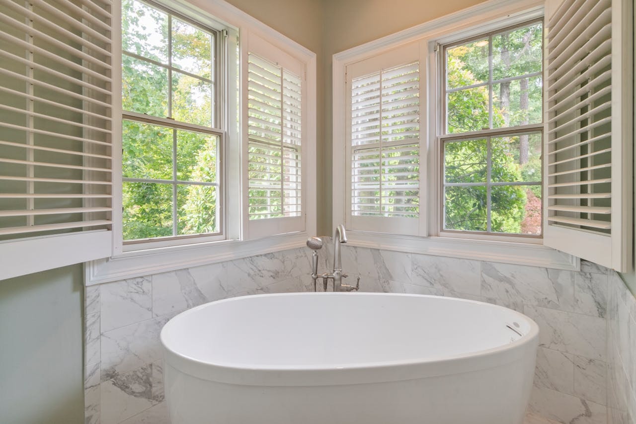 bathroom windows with plantation shutters