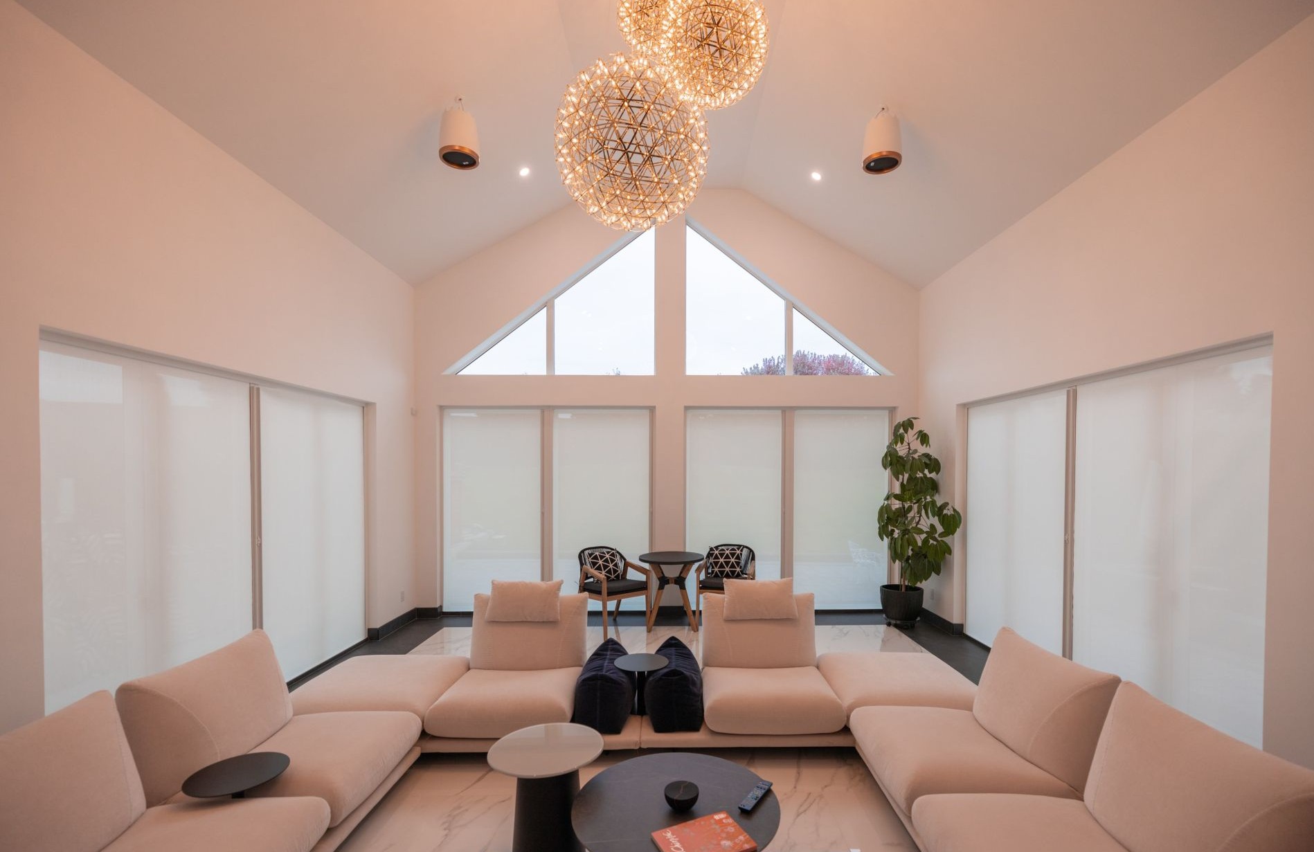 living room with Magic's solar shades as window coverings