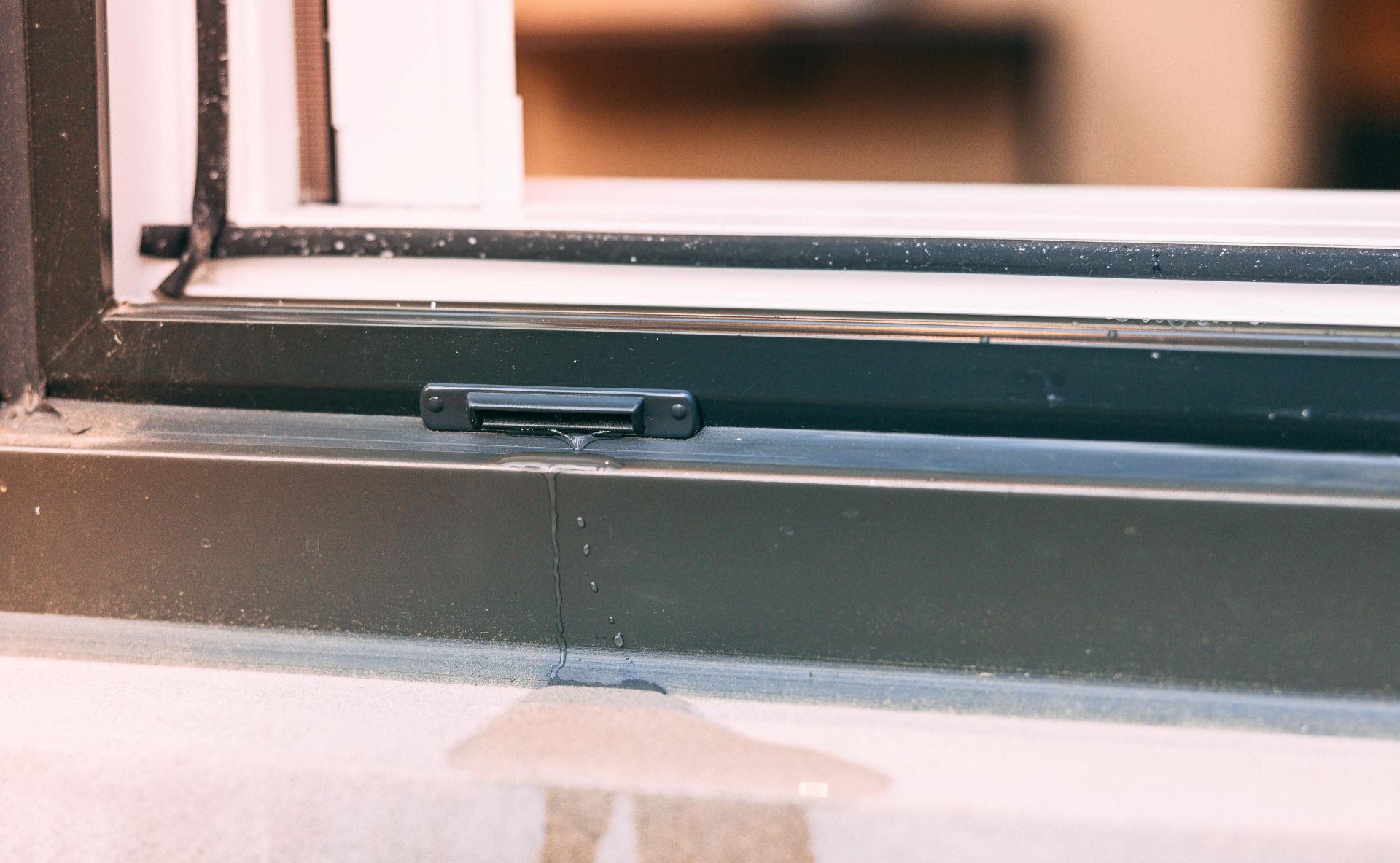 sliding window weep hole