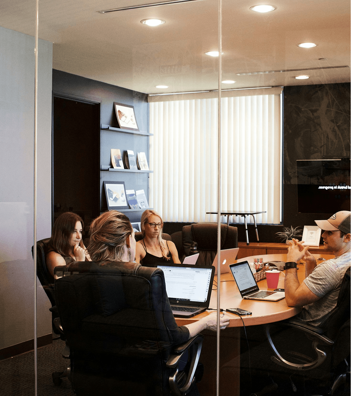 Corporate transformation team discussing the foundation of digital HR system integration.