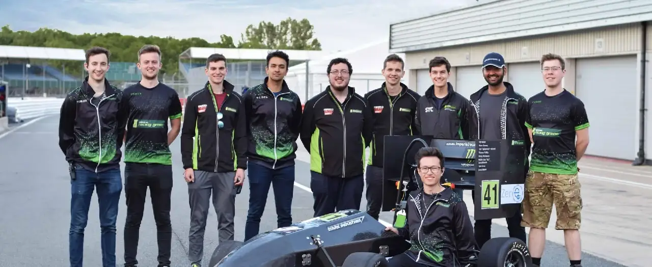 A group of men standing next to each other