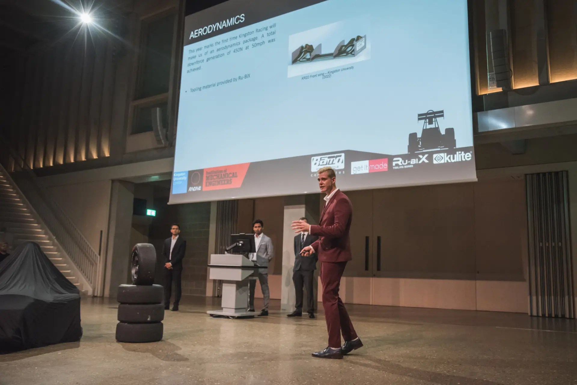 Kingston University Racing team presenting a car
