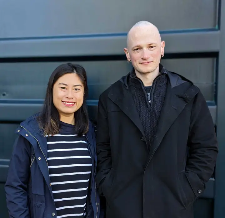 A man and a women posing for a photo.