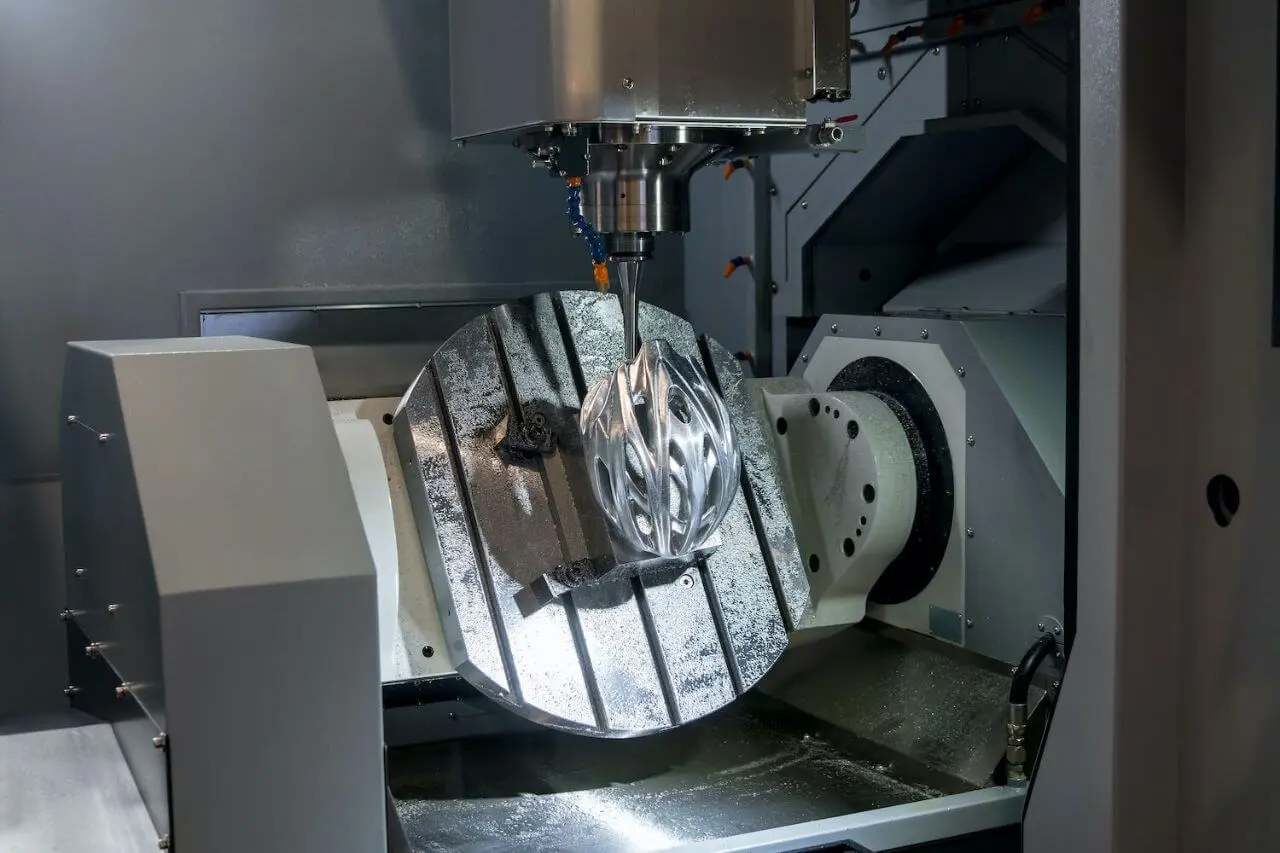 A machine with a metal object on it.