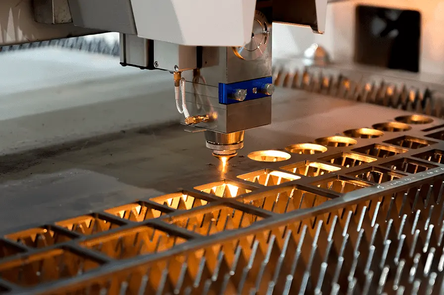 A close up of a machine working on a piece of metal