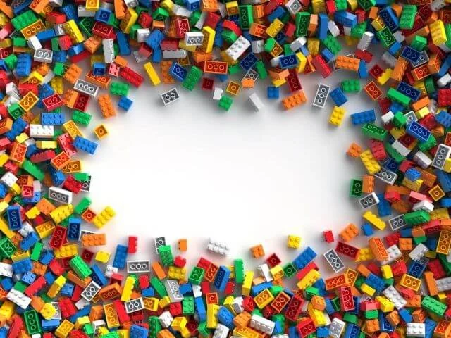 A group of colourful building blocks.