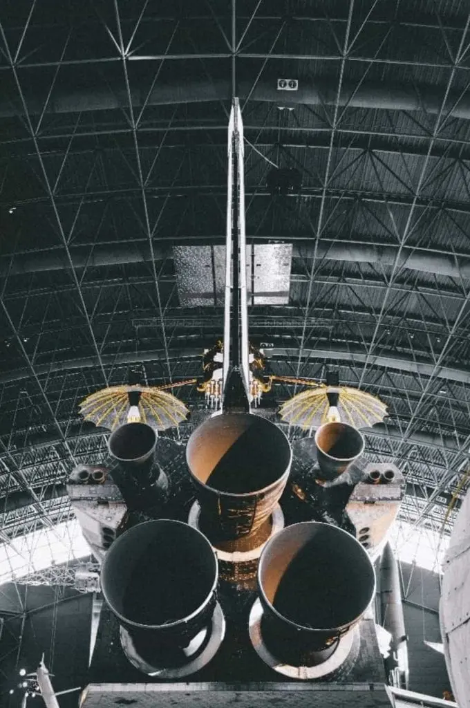 A black and white photo of a space shuttle