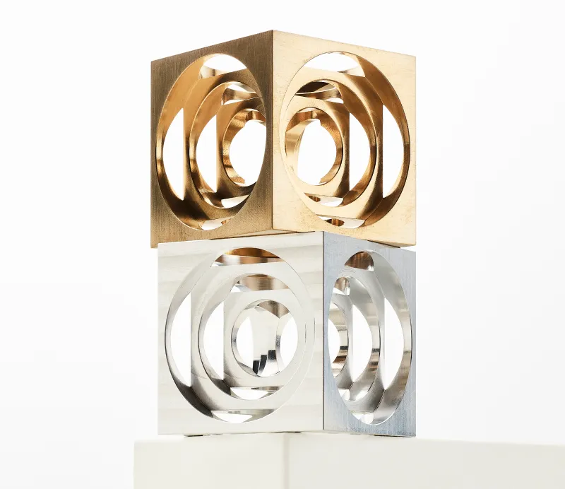 Precision machined metal cube with multiple threaded circular holes