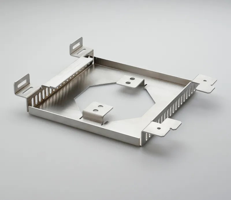 Metallic cube with multiple precision-machined cylindrical holes