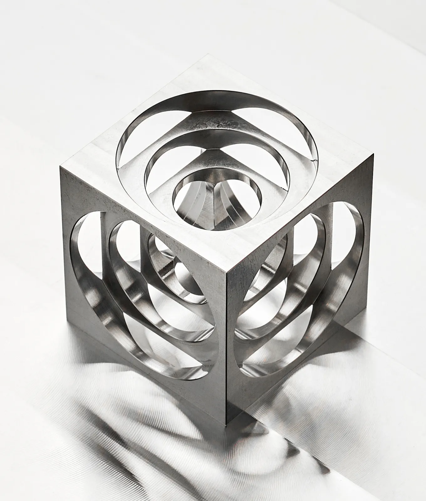A metal stand with two metal brackets on it