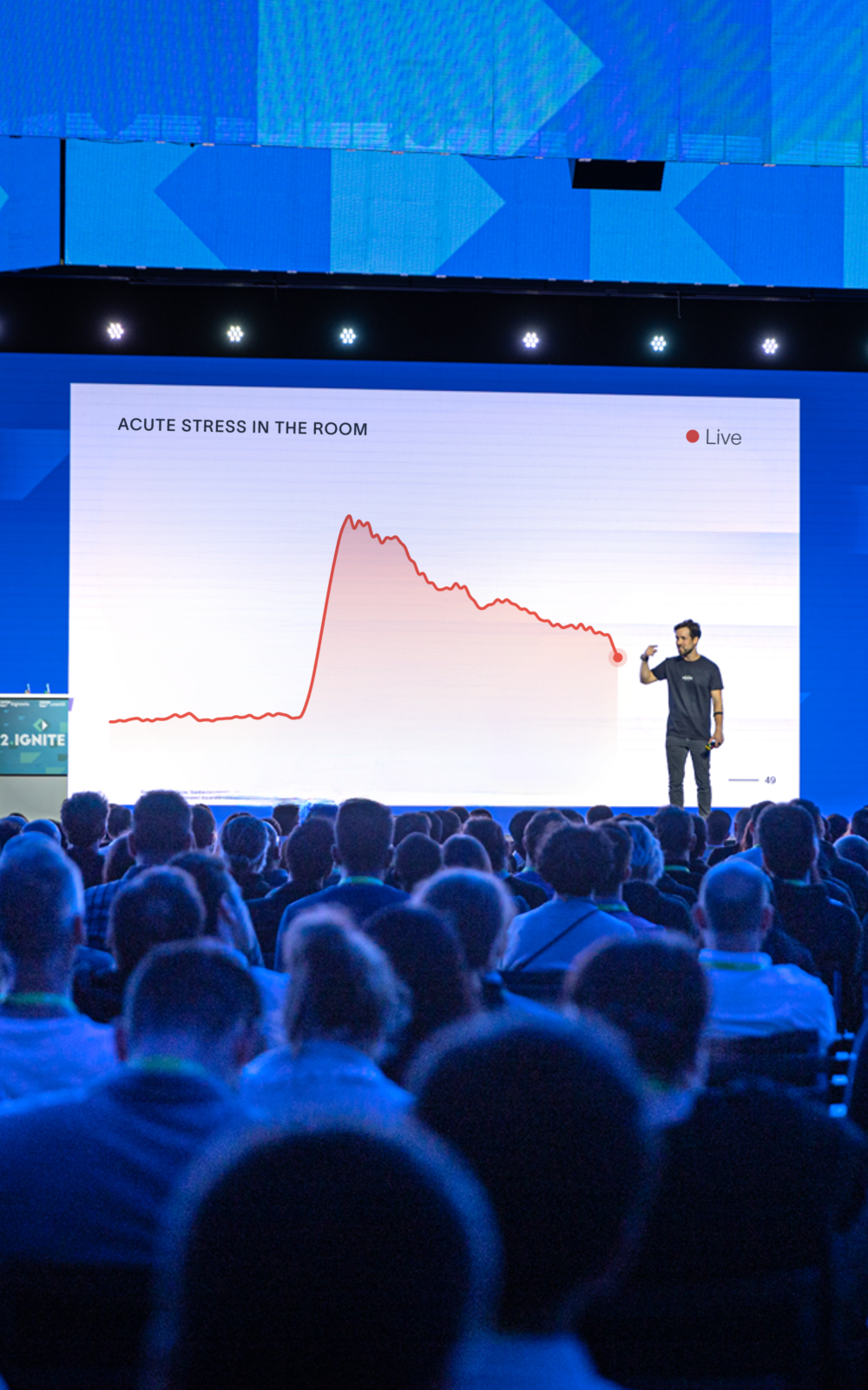 Sapiens keynote on stage in front of a full audience