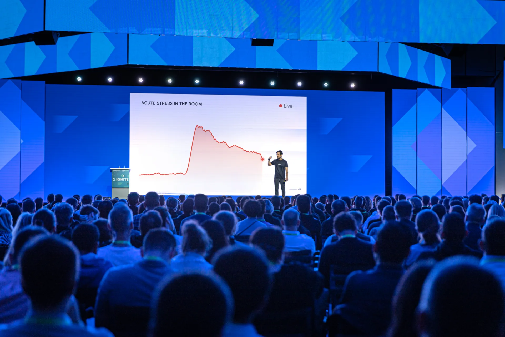 Sapiens keynote on stage in front of a full audience