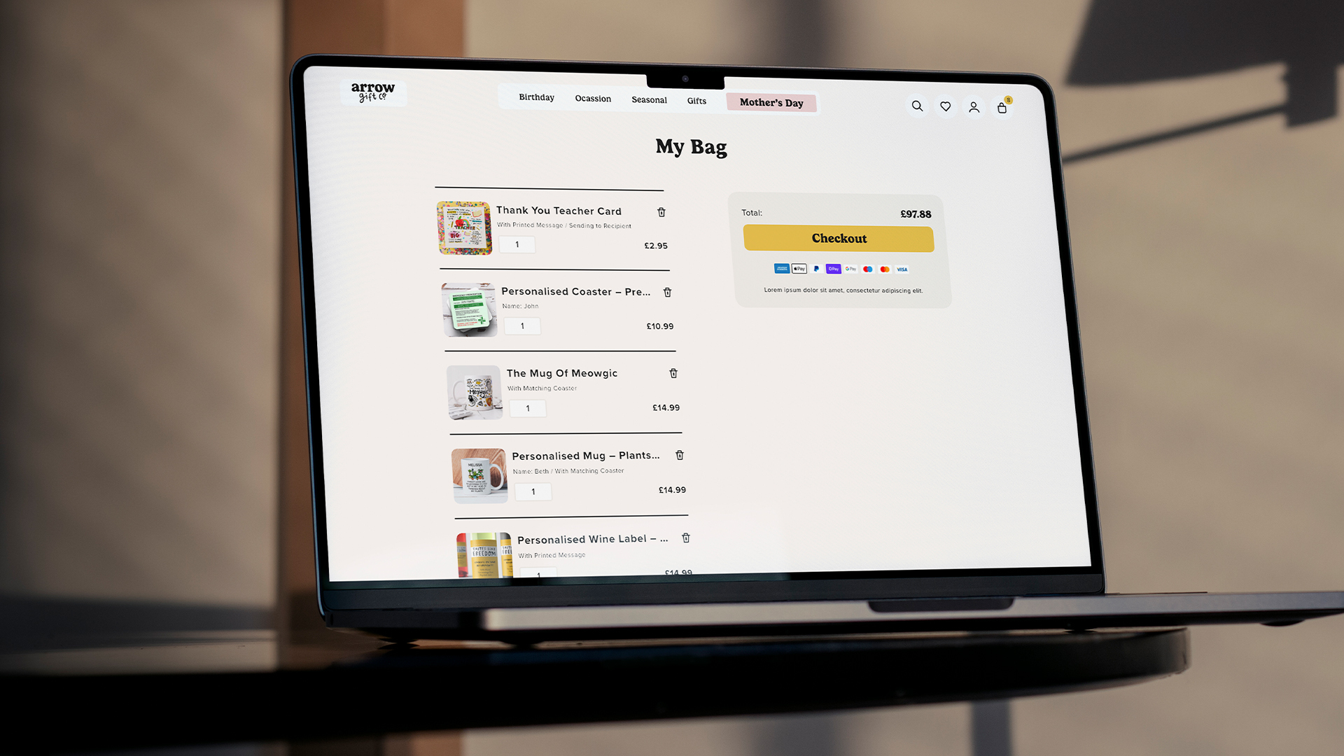 Arrow Gift Co Shopify Website on a laptop