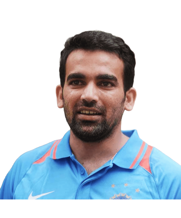 Man with short black hair and beard wearing a blue sports jersey with an emblem and stars.
