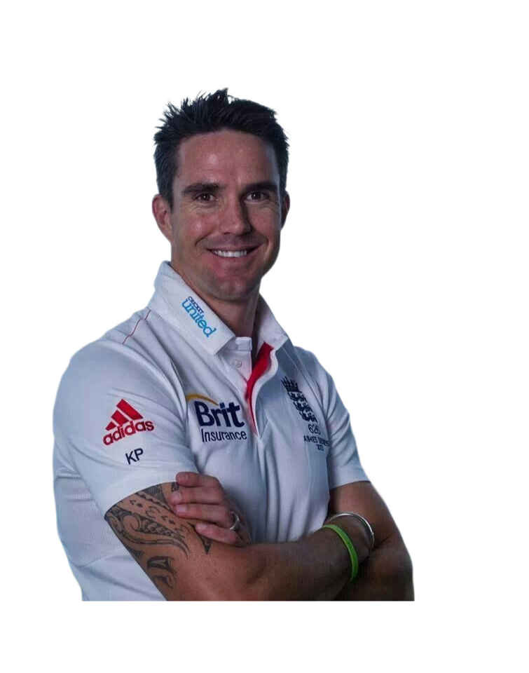Smiling man in a white England cricket shirt with tattoos on his arm and crossed arms.