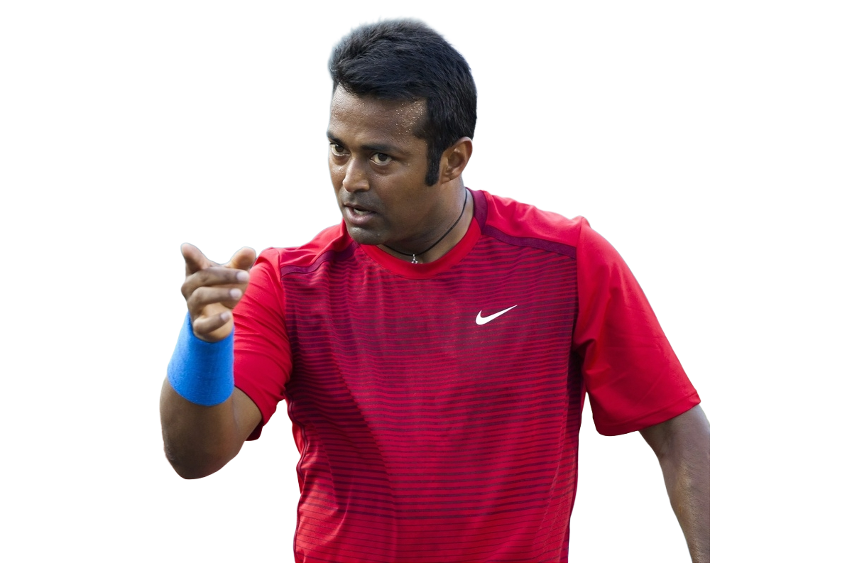 Man in red Nike shirt with blue wristband pointing forward with intense focus.
