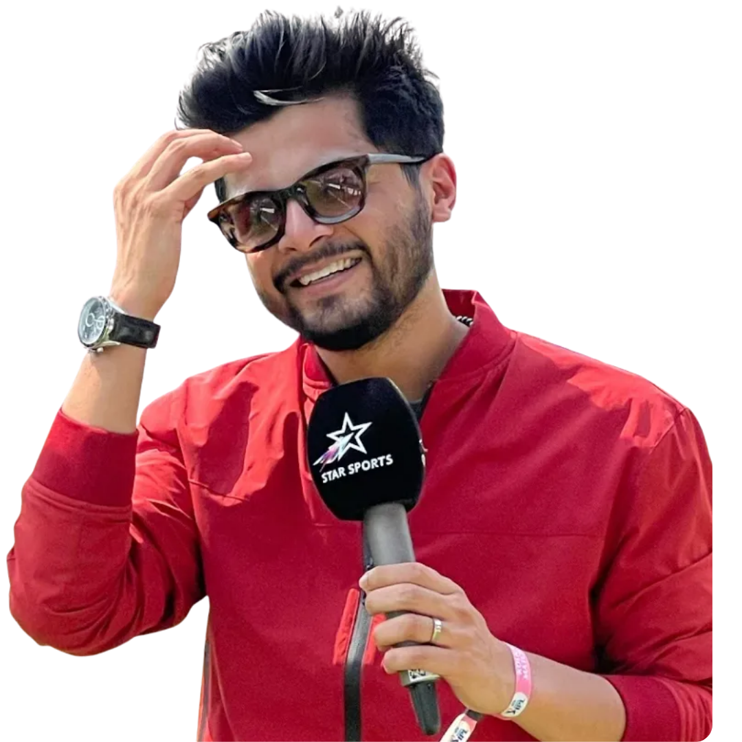 Man wearing sunglasses and a red jacket holding a Star Sports microphone, smiling while touching his hair.