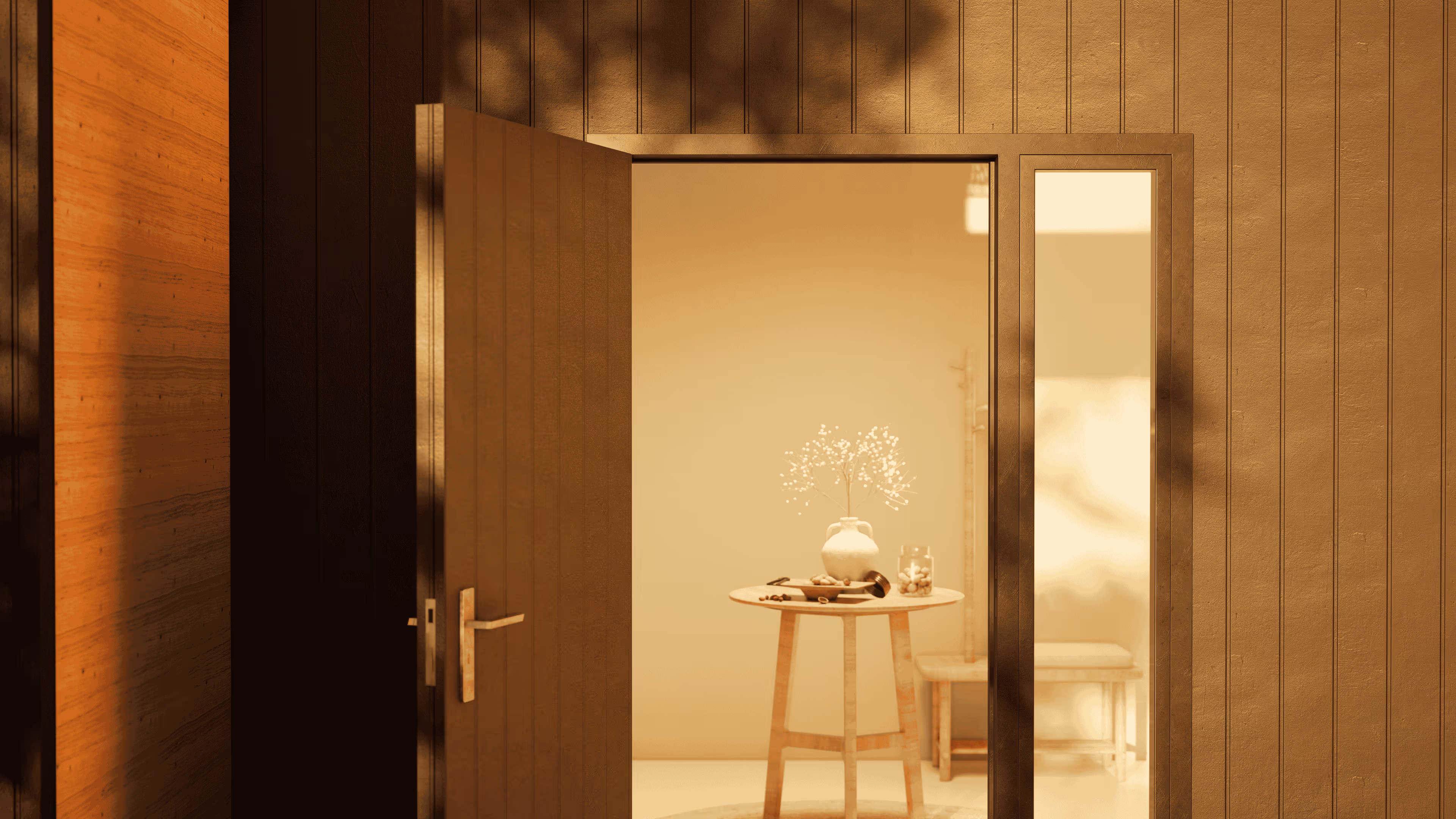 Open wooden door revealing a round wooden table with a vase of white flowers and decorative items inside a warmly lit room.
