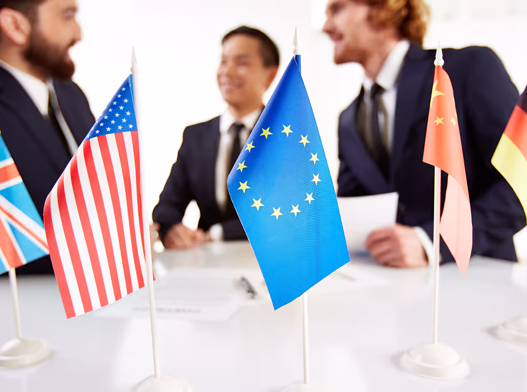 International business meeting with global flags.