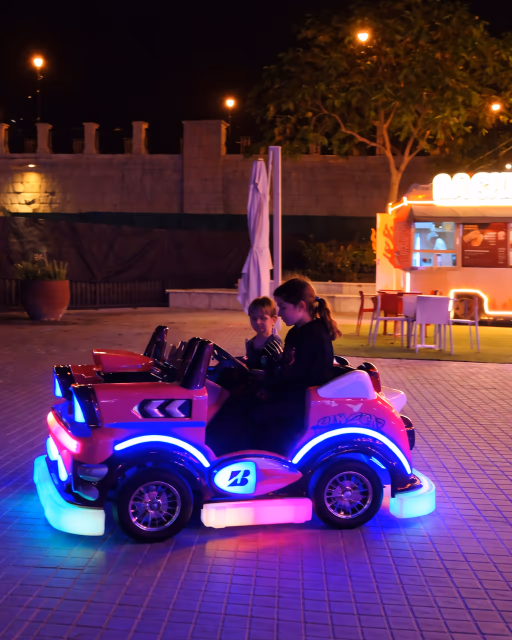 glowing kids car at night