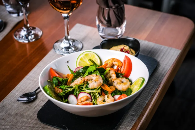Creole salad with fresh shrimp served with white wine Bambouresort Martinique