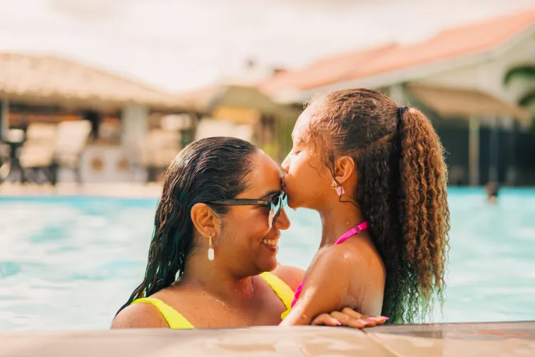 Mother and daughter bonding in the pool at Bambouresort Martinique