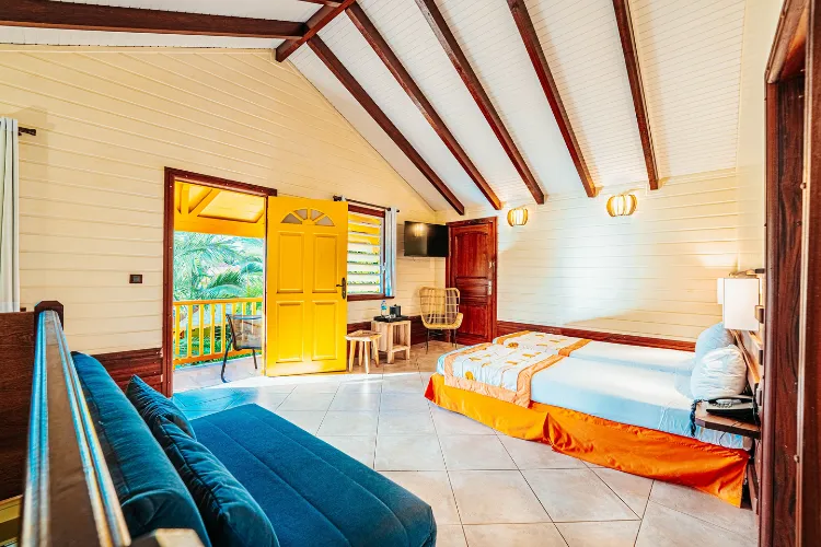 Bungalow luxe Harmonie tropical view double bed sofa bed balcony Bambouresort Martinique