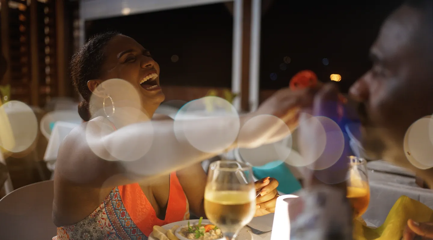 Guests enjoying cocktails and evening meals at the O'Deck Bambou Resort Martinique restaurant