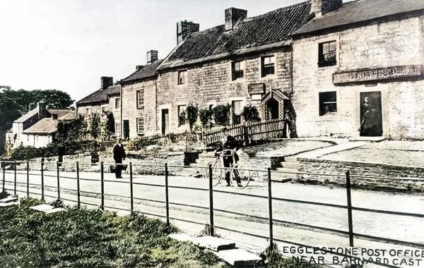 Old photo of houses in village