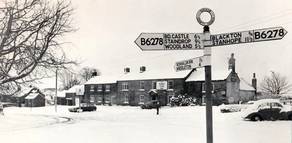 Old photo of village in snow