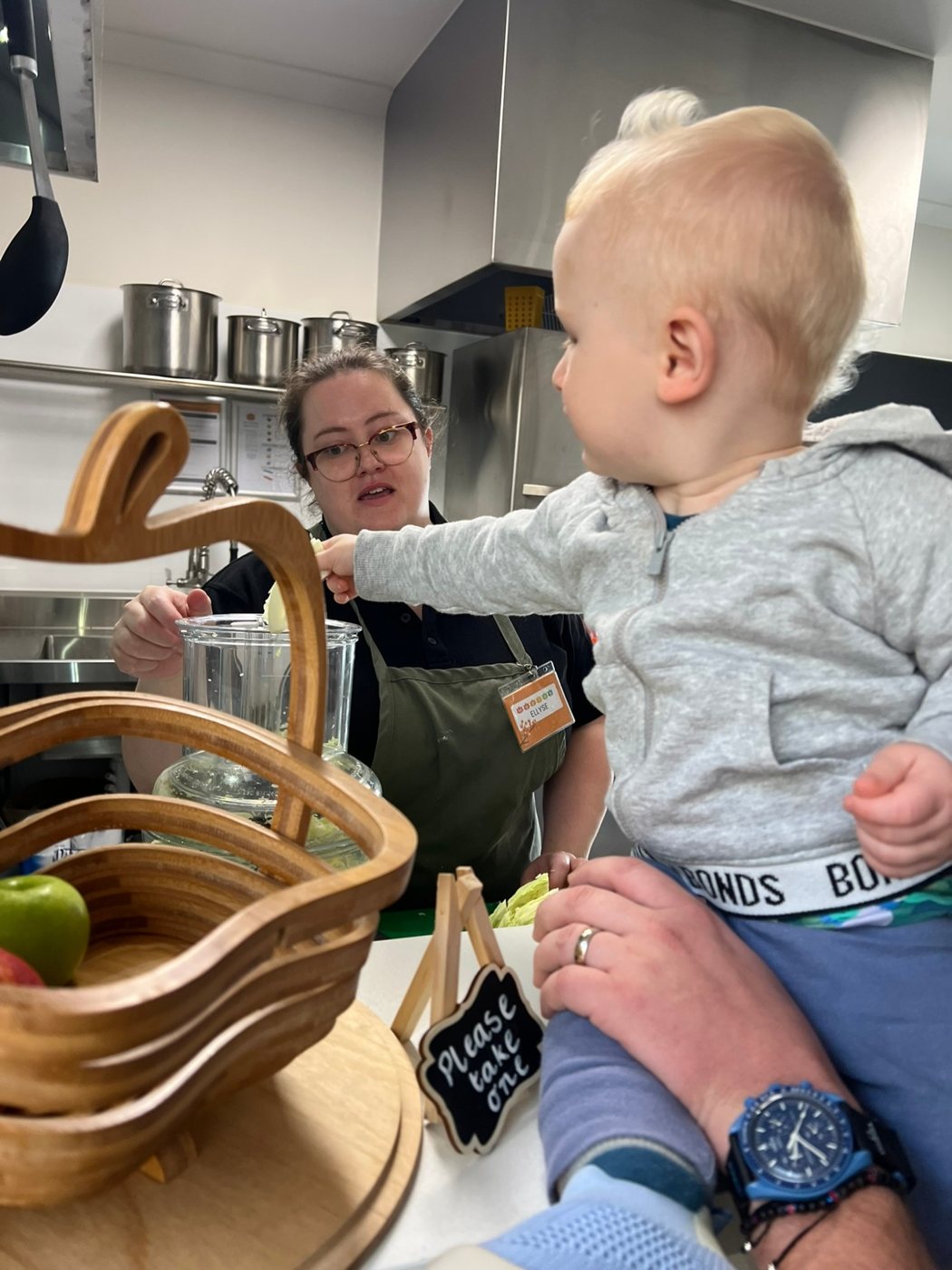 A baby helping the chef in the Maples kitchen