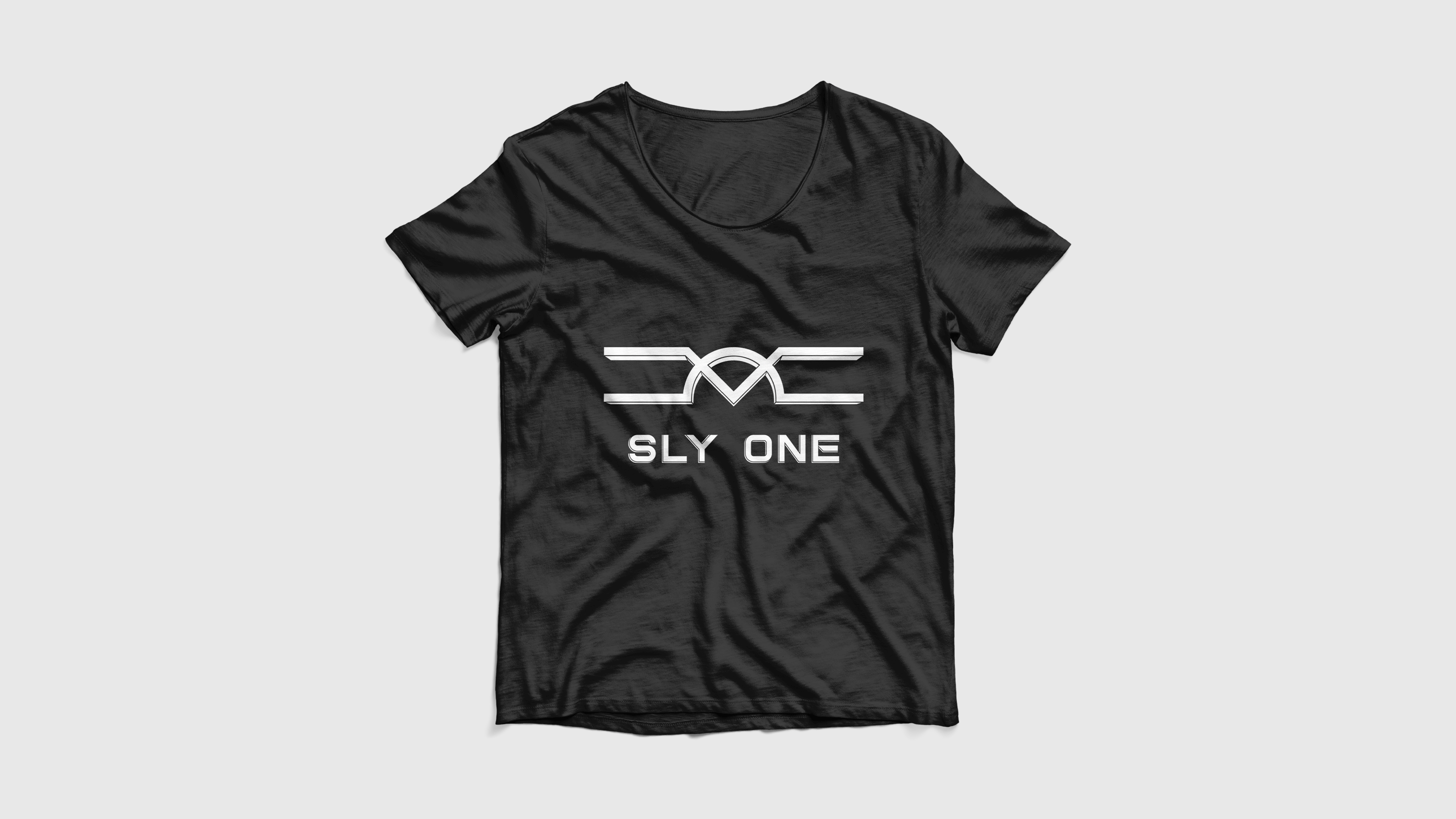 A mockup of the Sly One logo design on a black t-shirt.
